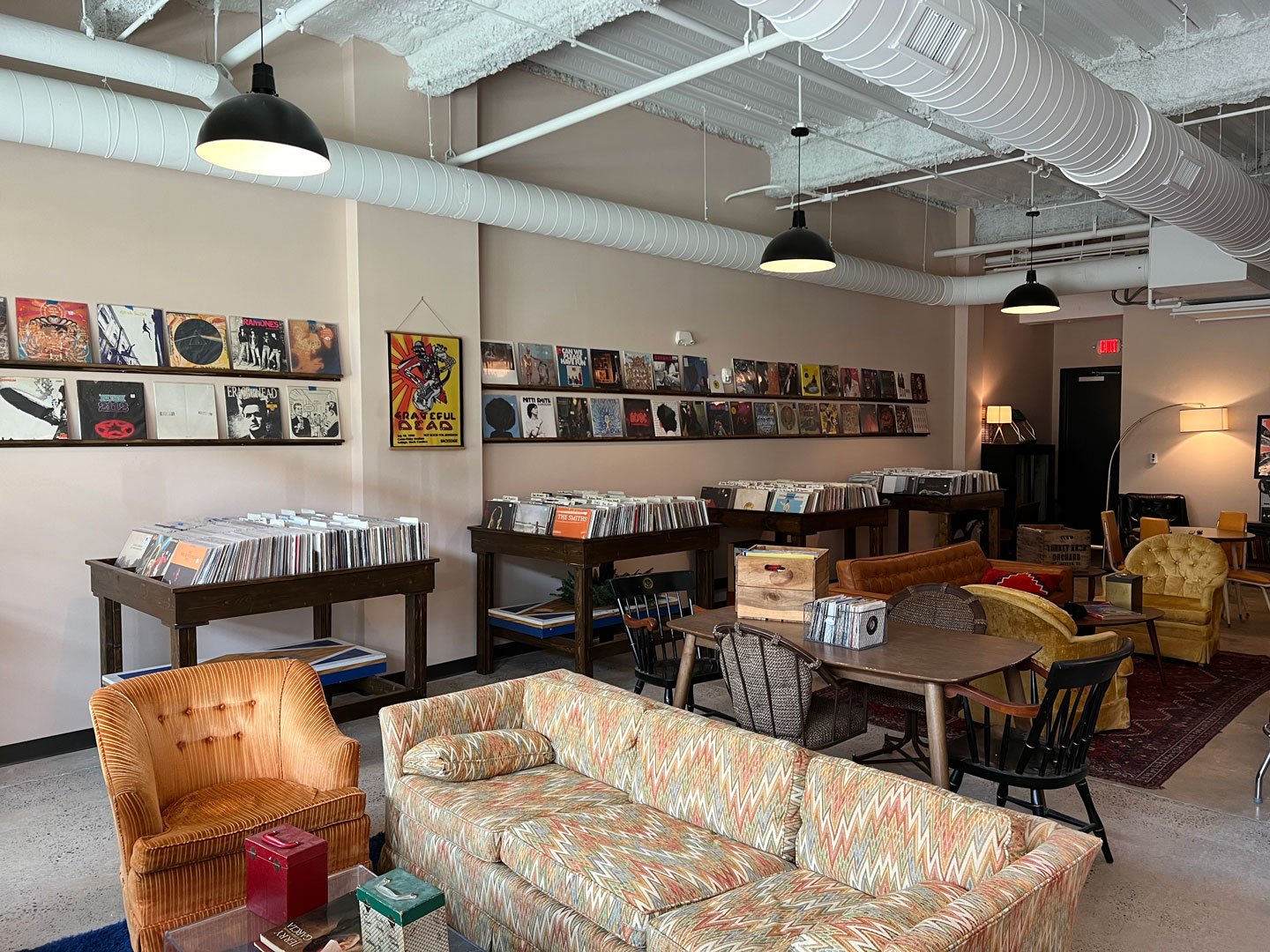 Inside Hunky Dory at Raleigh Iron Works — crates of vinyl and listening lounge